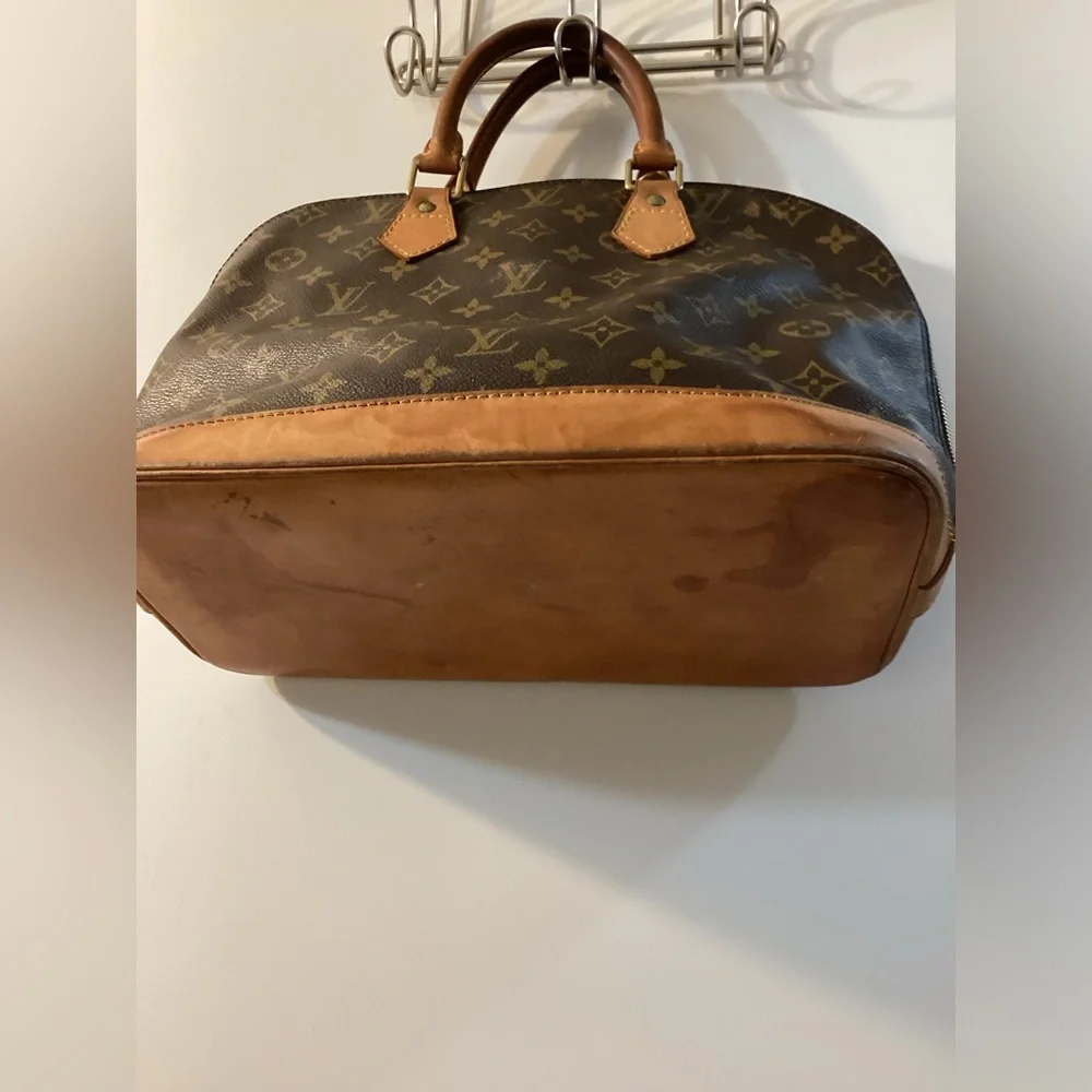 Louis Vuitton Monogram Alma Handbag Brown Coated Canvas Leather